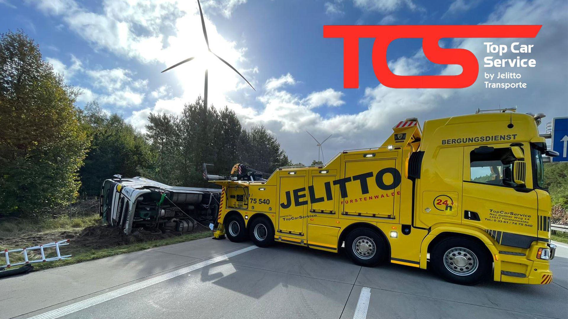 Schlepper richtet LKW auf